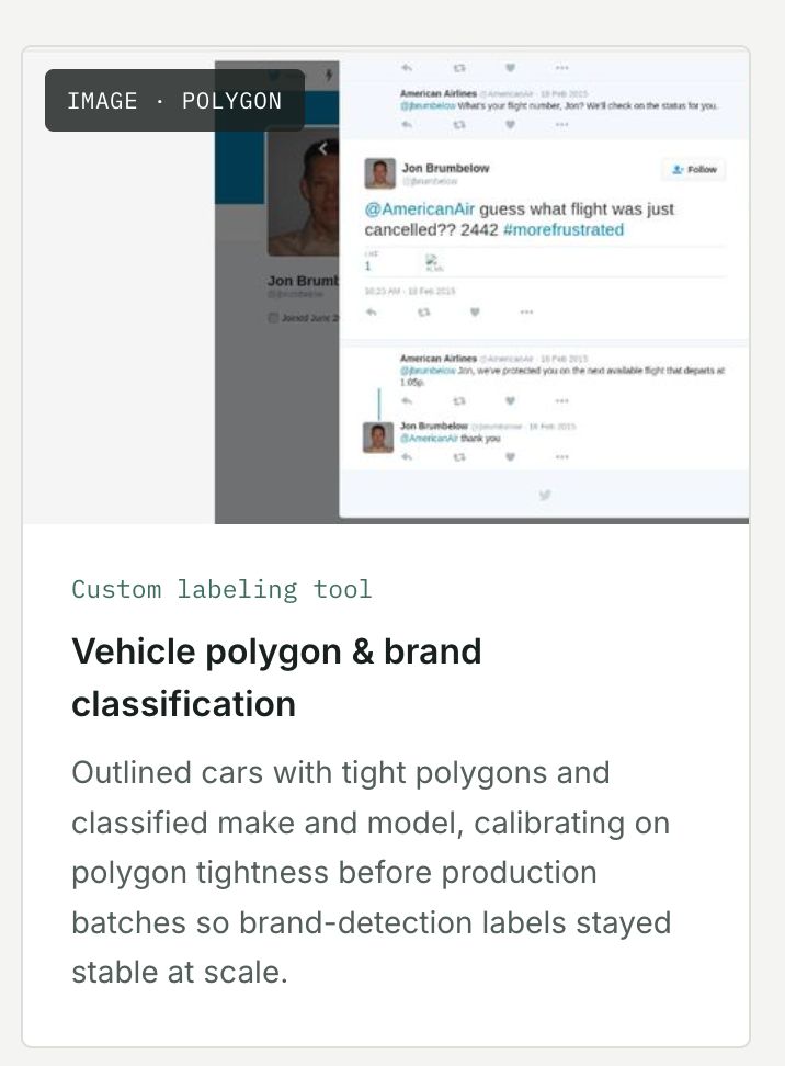 Twitter-style customer service conversation between a user and American Airlines, showing sentiment and reply-labeling tags